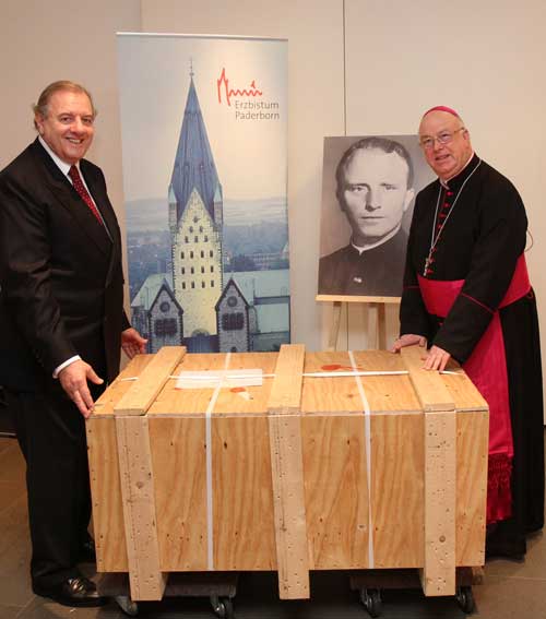 Archbishop Hans-Josef Becker and Dr. Andrea Ambrosi